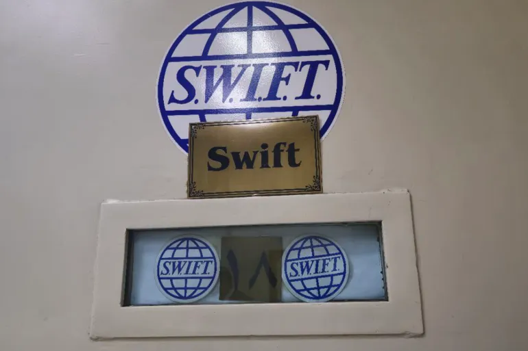 شعار نظام سويفت داخل مصرف سوريا المركزي (حساب مصرف سوريا المركزي على تلغرام)