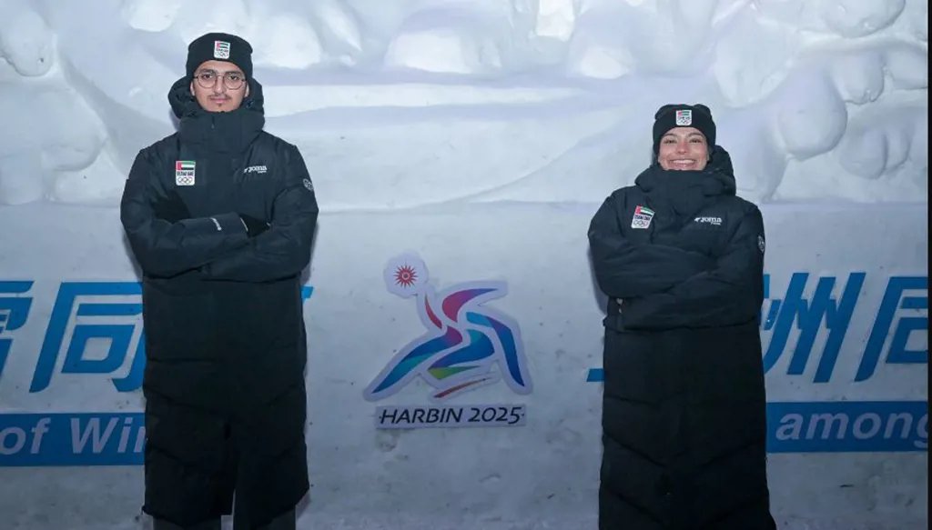 آمنة المهيري وسلطان الكندي يحملان علم الإمارات في حفل افتتاح دورة الألعاب الآسيوية الشتوية