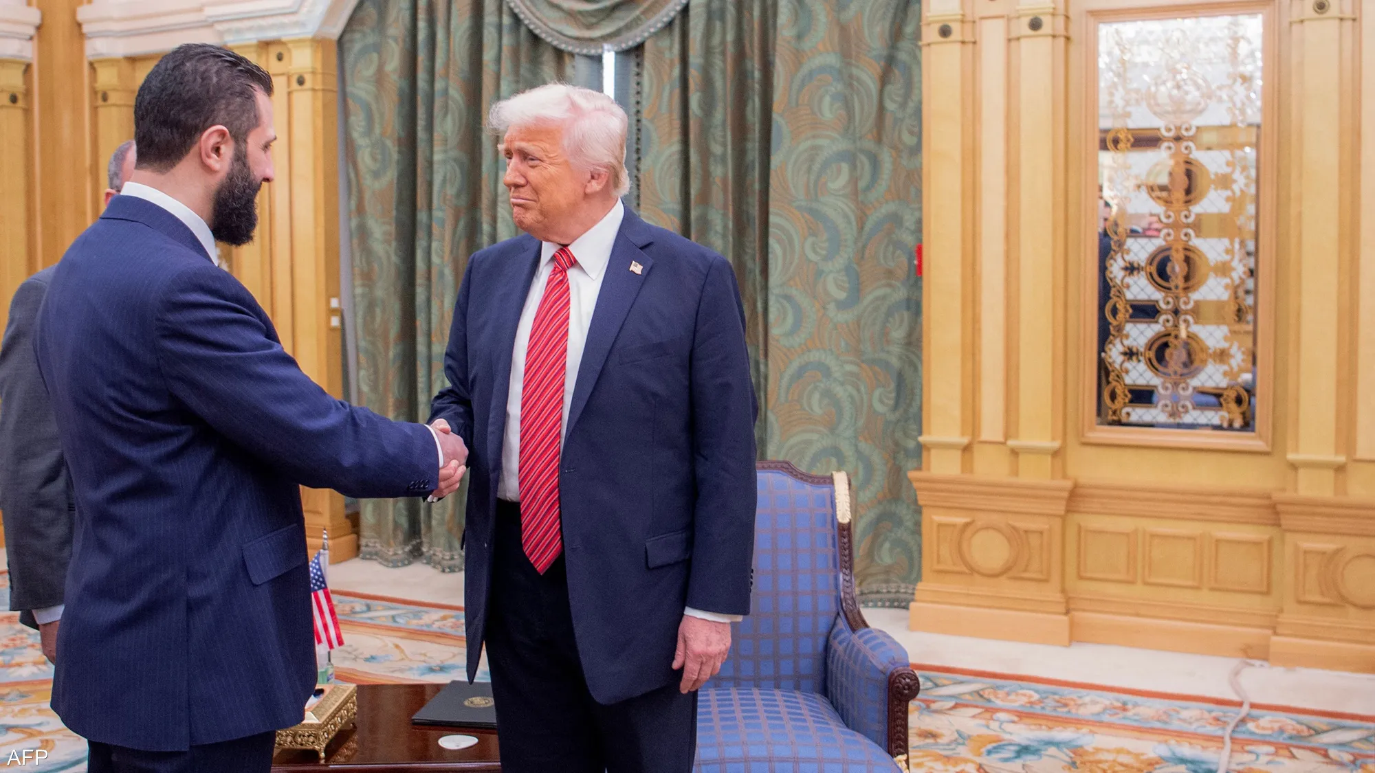 ترامب والشرع خلال لقاء سابق (أرشيفية)