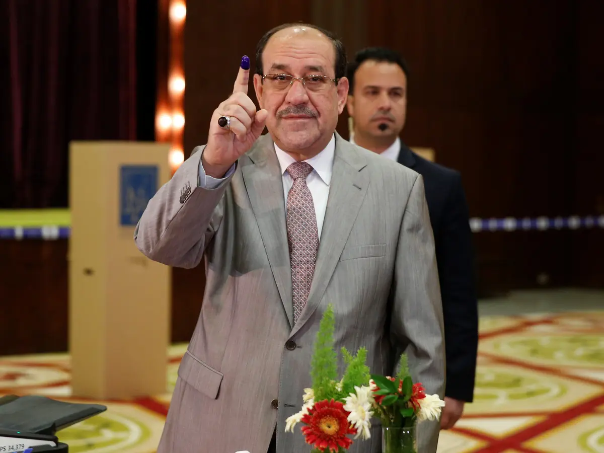 نوري المالكي بعد الإدلاء بصوته في الانتخابات البرلمانية (أرشيفية)