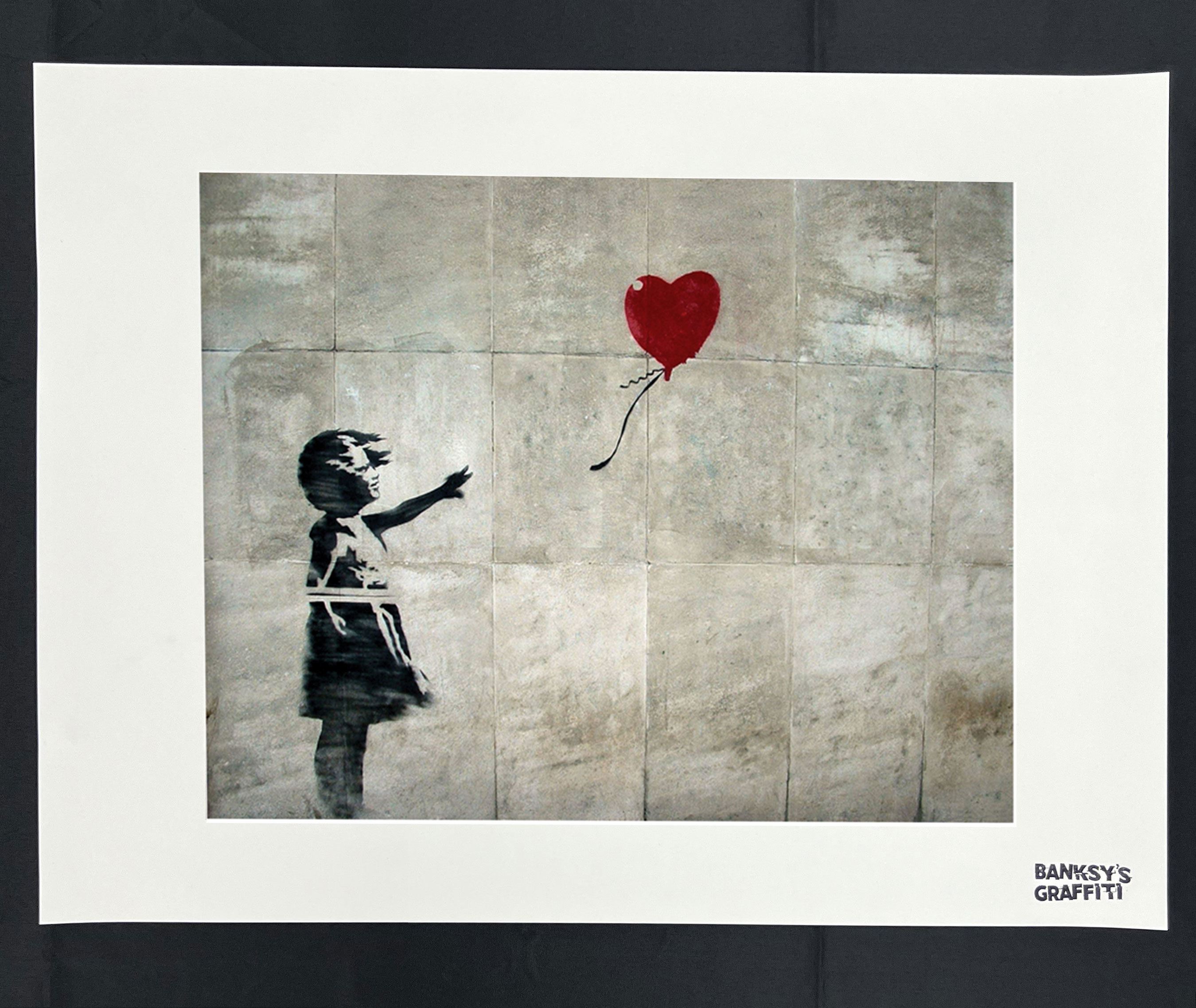 العثور على لوحة "فتاة مع بالون" المسروقة للفنان بانكسي