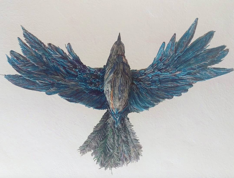 الطائر الورقي المتفلِّت من القفص.