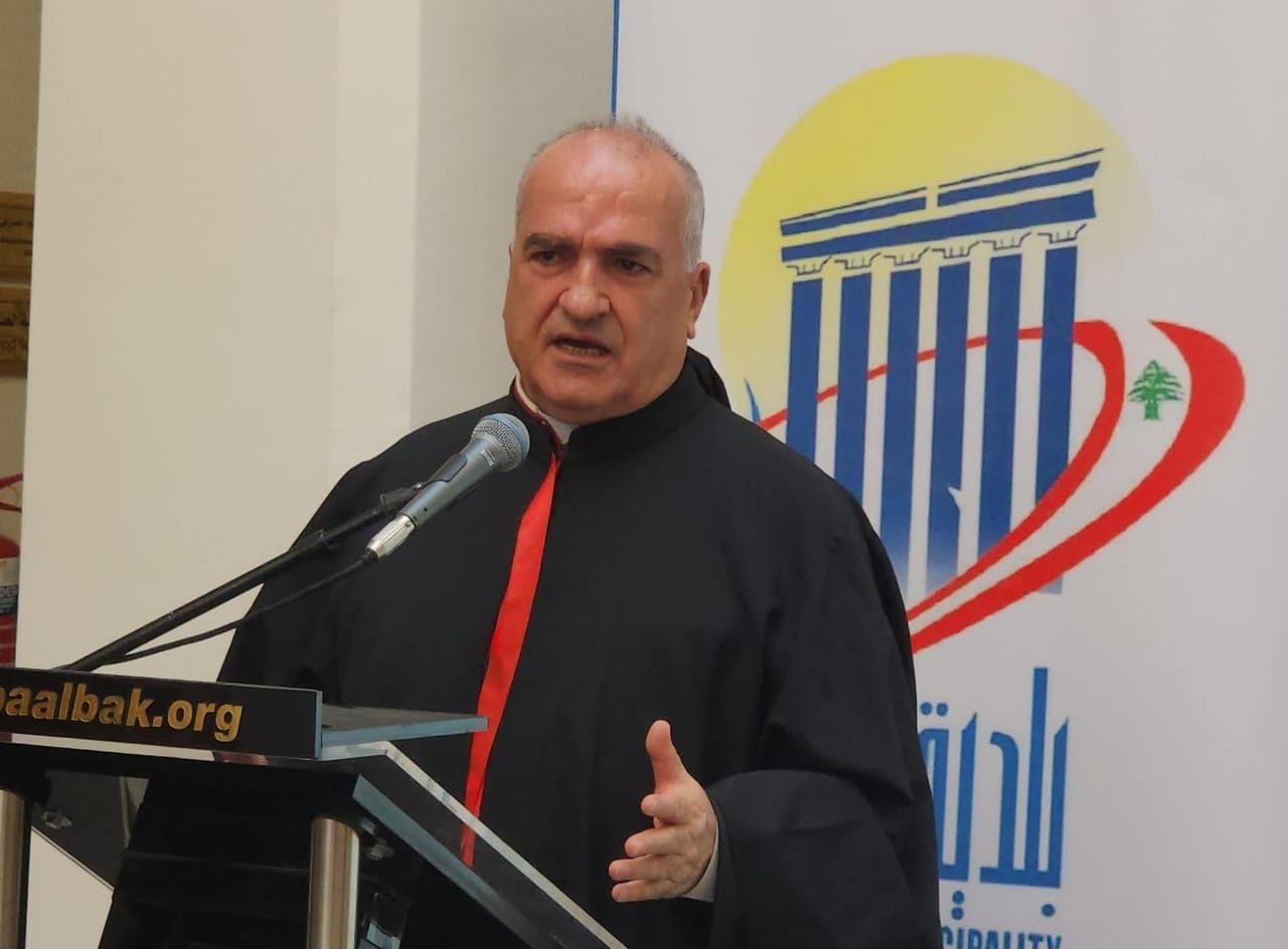 راعي أبرشية بعلبك دير الأحمر المارونية المطران حنا رحمة (لينا اسماعيل).