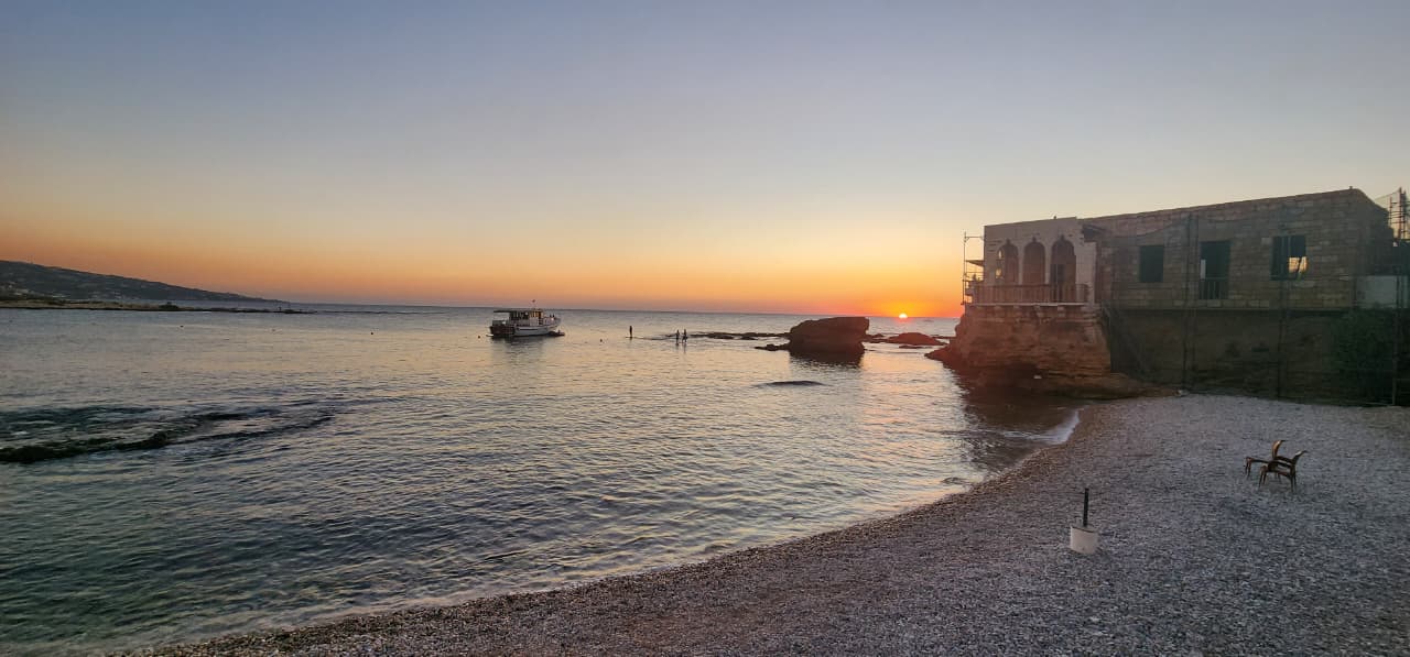 غروب الشمس في البترون (ميشال حلاق).