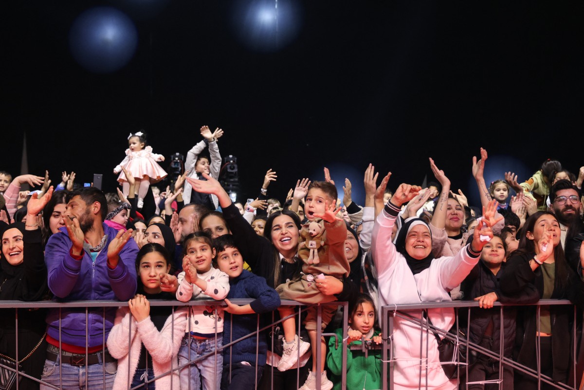 مشاركون في برنامج رمضاني (ا ف ب)