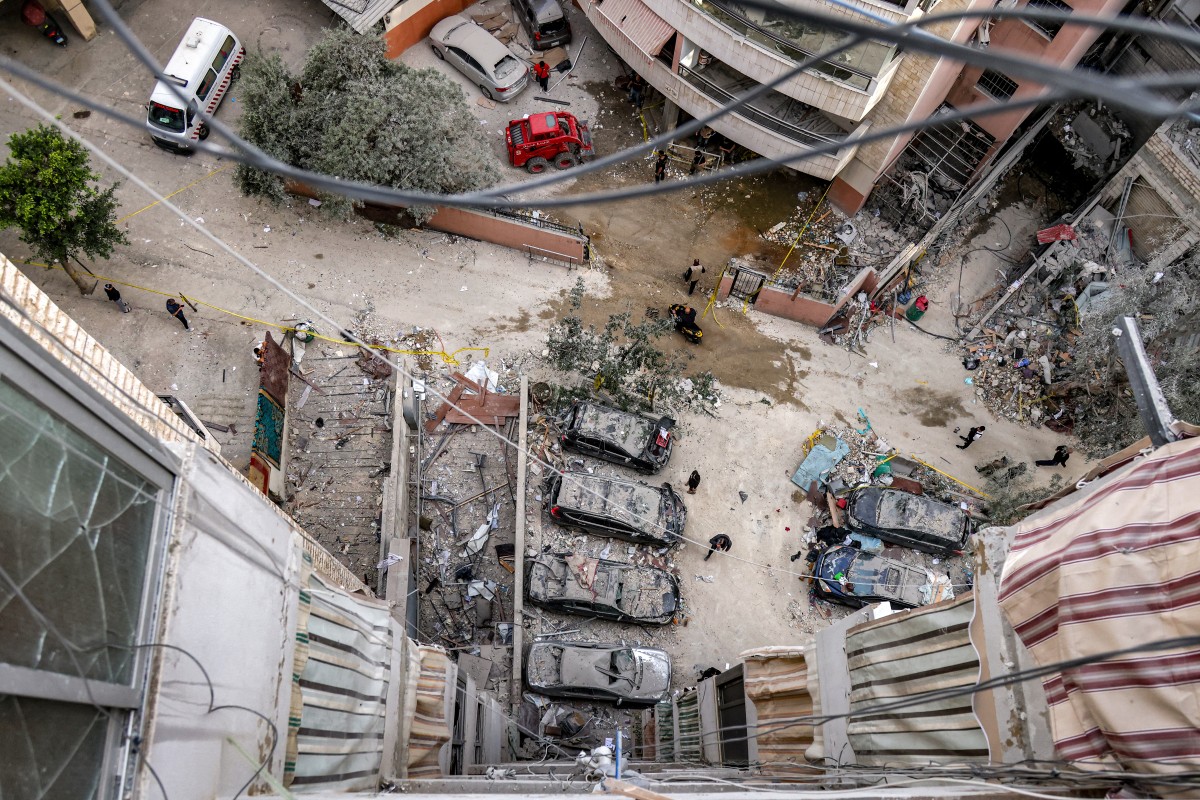 آثار الضربة الاسرائيلية في الضاحية الجنوبية لبيروت (ا ف ب)