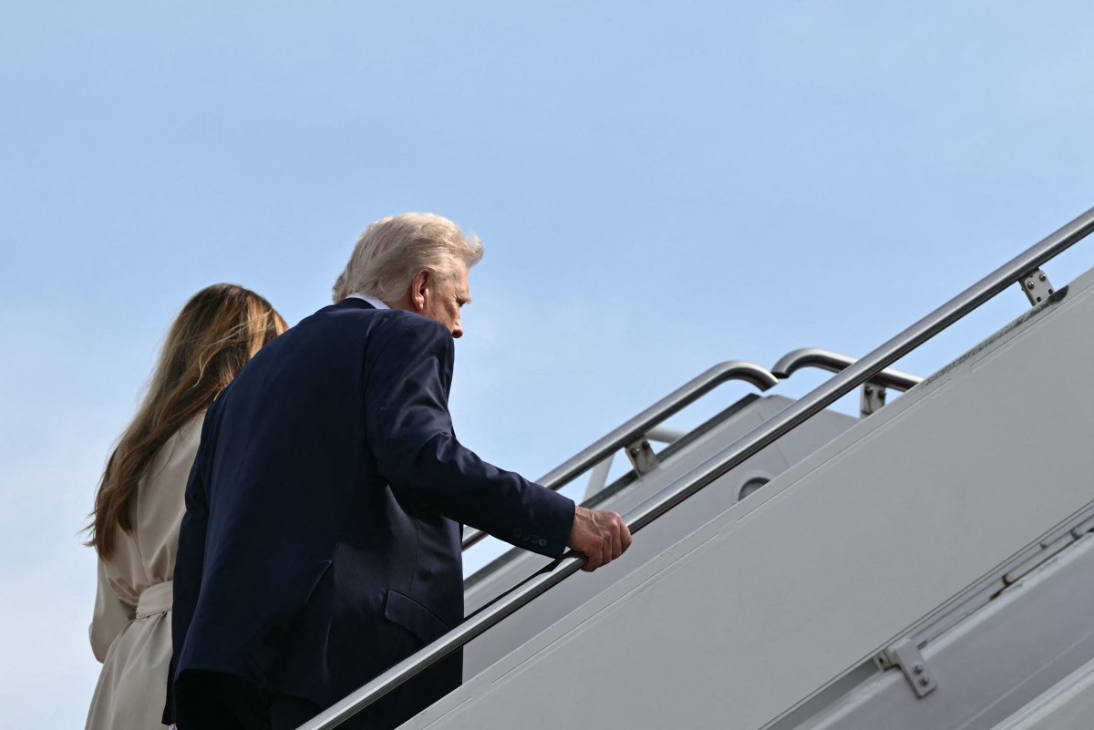 ترامب وميلانيا (ا ف ب)