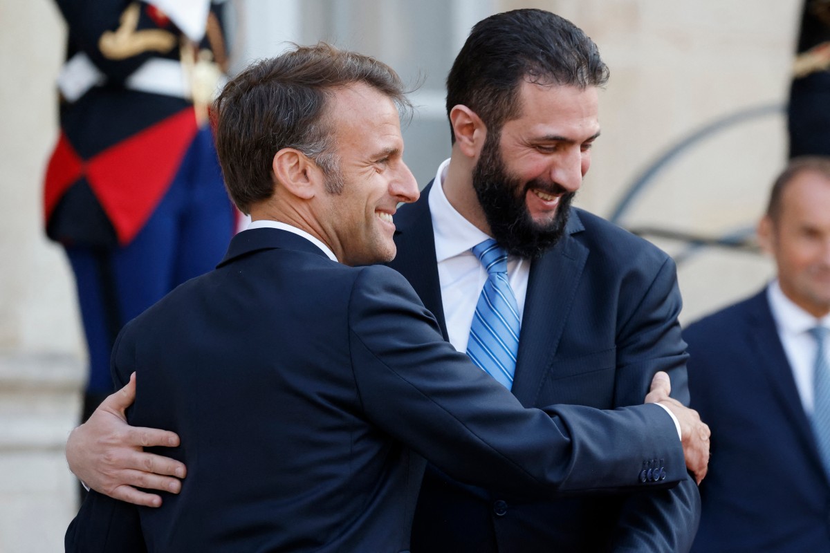 ماكرون والشرع (أ ف ب)