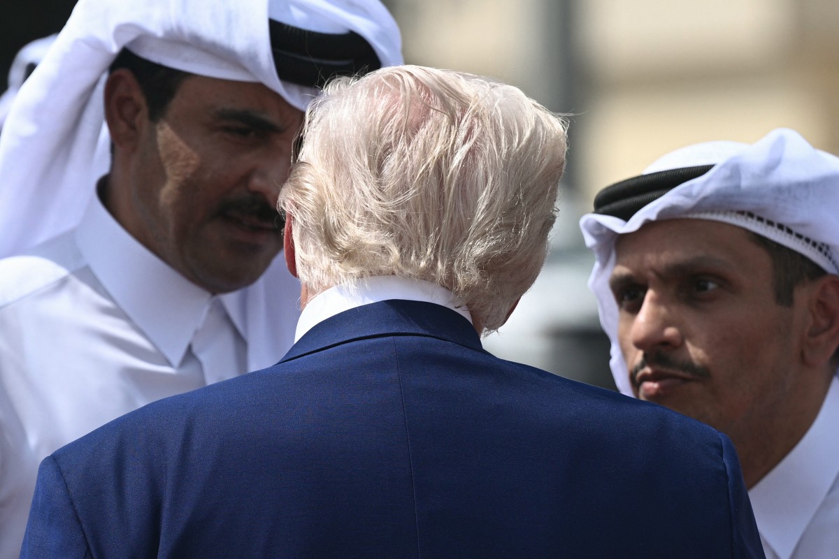 أمير قطر ورئيس الوزراء ووزير الخارجية يتحدثان إلى ترامب (أ ف ب)