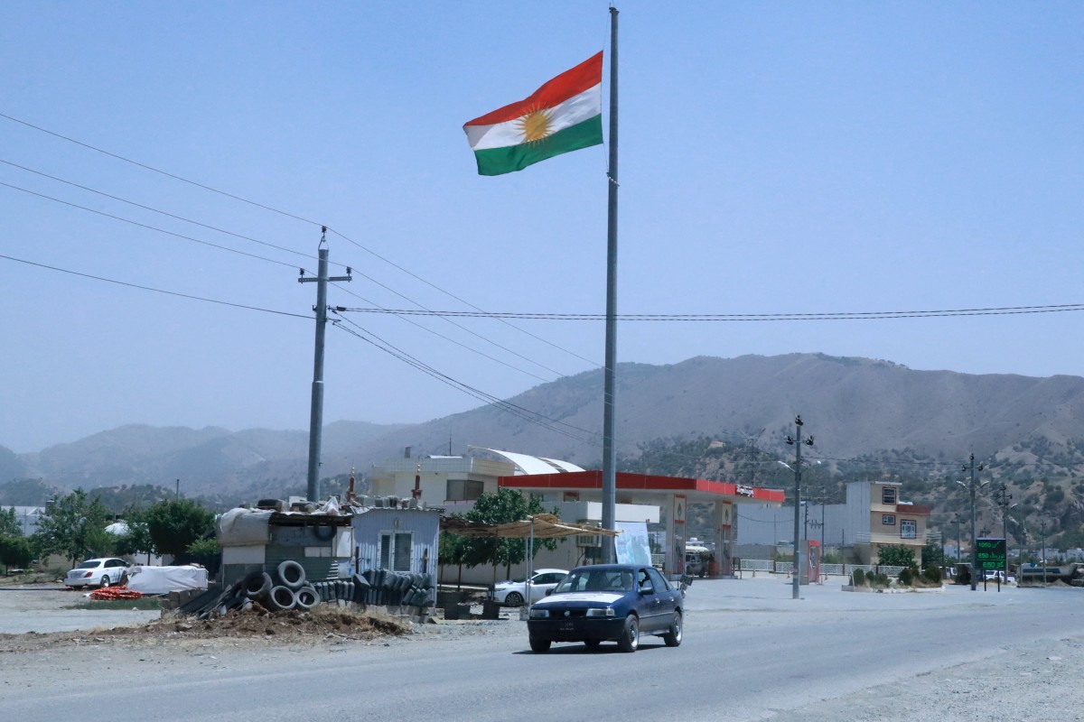 استمر التبادل التجاري عبر المعابر الحدودية الثلاثة الرئيسية بين كردستان وإيران. (ا ف ب)