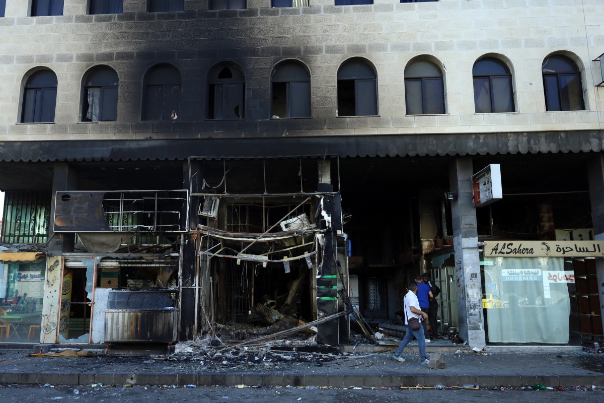 السويداء مدينة منكوبة (أ ف ب).