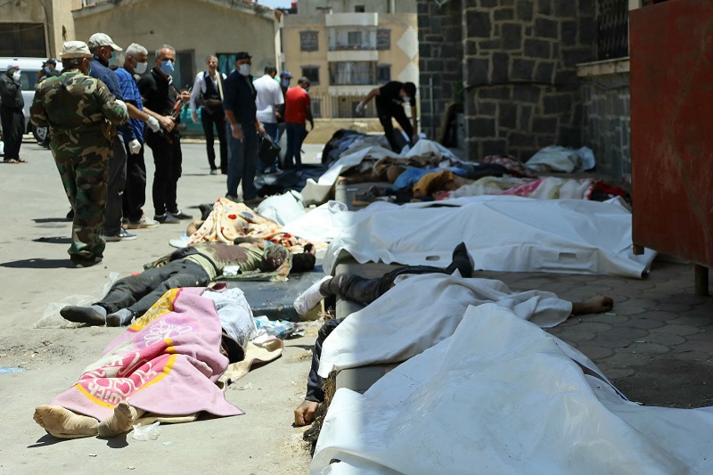 جثث لضحايا في السويداء (ا ف ب)