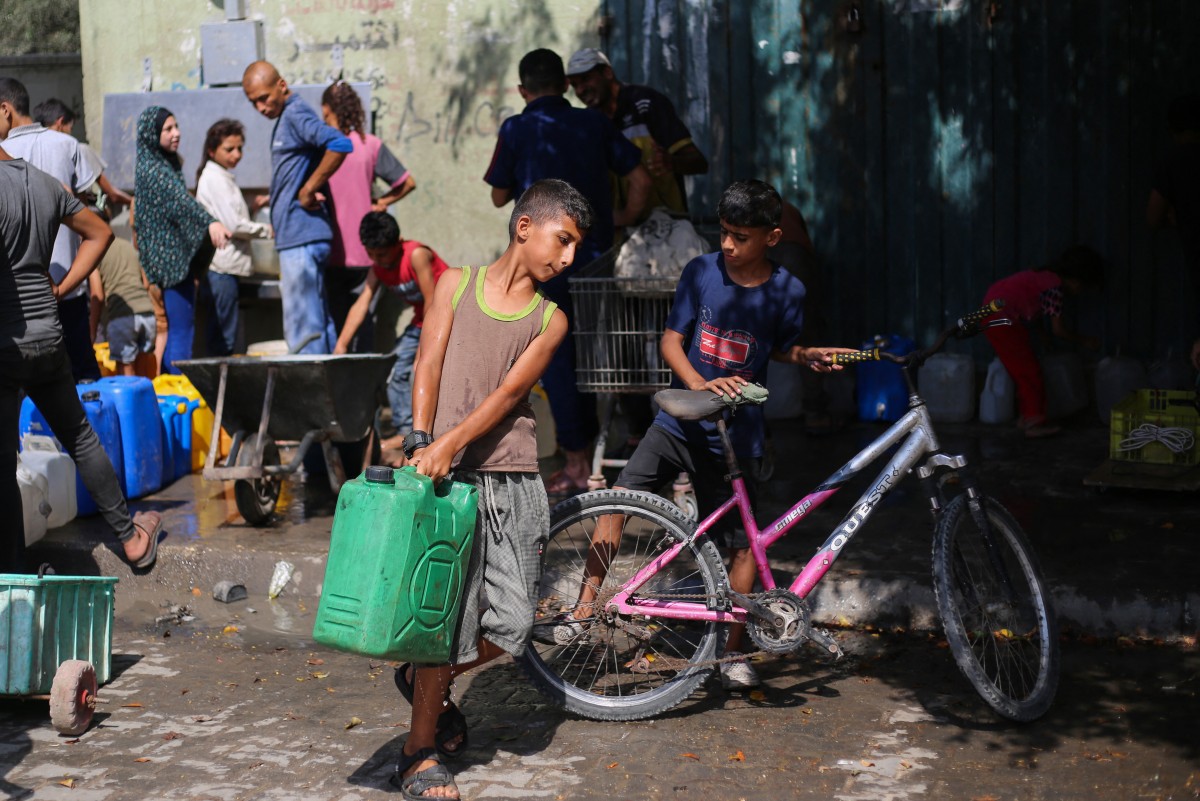 فلسطينيون في غزة. (أ ف ب)