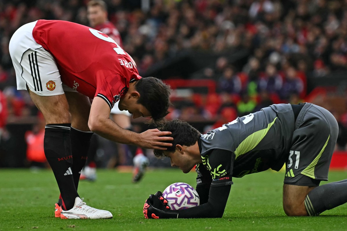 هاري ماغواير مع مانشستر يونايتد. (أ ف ب)