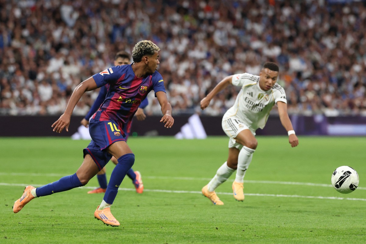 لامين يامال بمواجهة ريال مدريد. (أ ف ب)