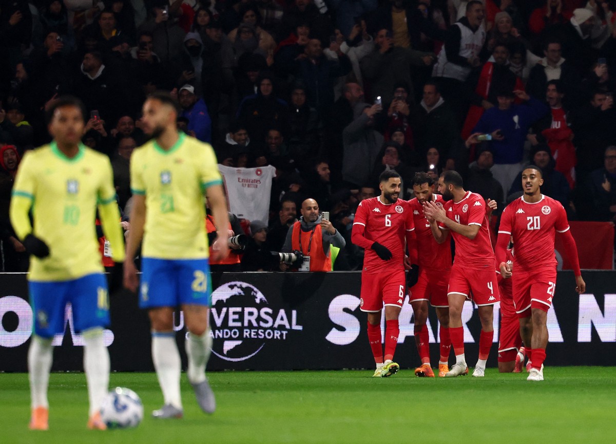 لاعبو تونس. (أ ف ب)