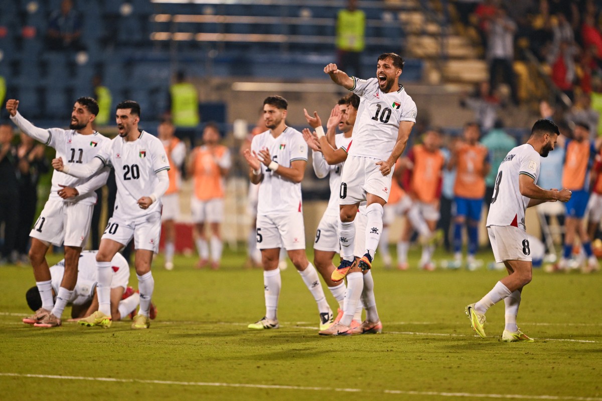 فرحة المنتخب الفلسطيني بالتأهل إلى كأس العرب 2025. (أ ف ب)