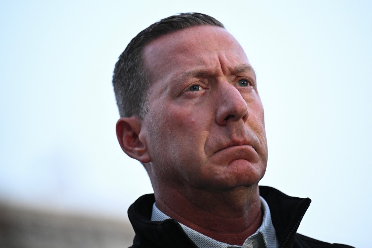 مدير الخدمة السرية الأميركية شون كوران يراقب خلال مؤتمر صحفي بعد حادث إطلاق نار في وسط مدينة واشنطن. (أ ف ب)