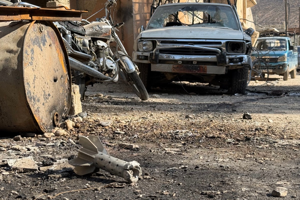 أضرار في بيت جن. (أ ف ب)