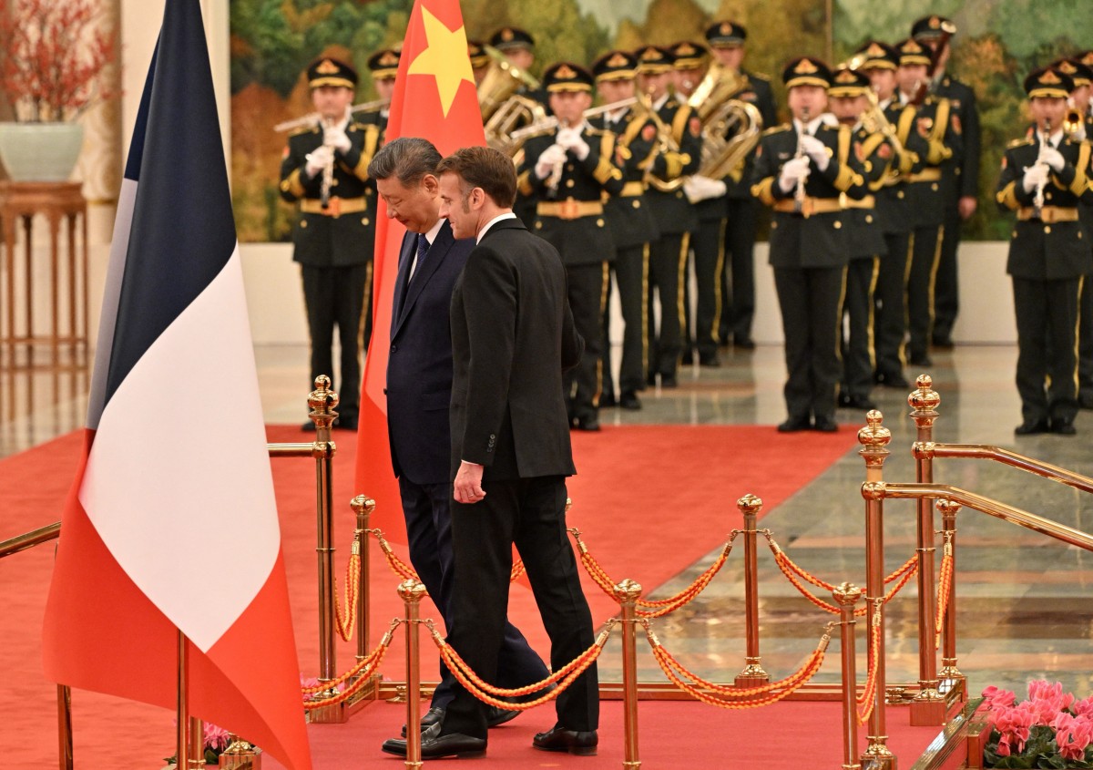 ماكرون وشي (أ ف ب).