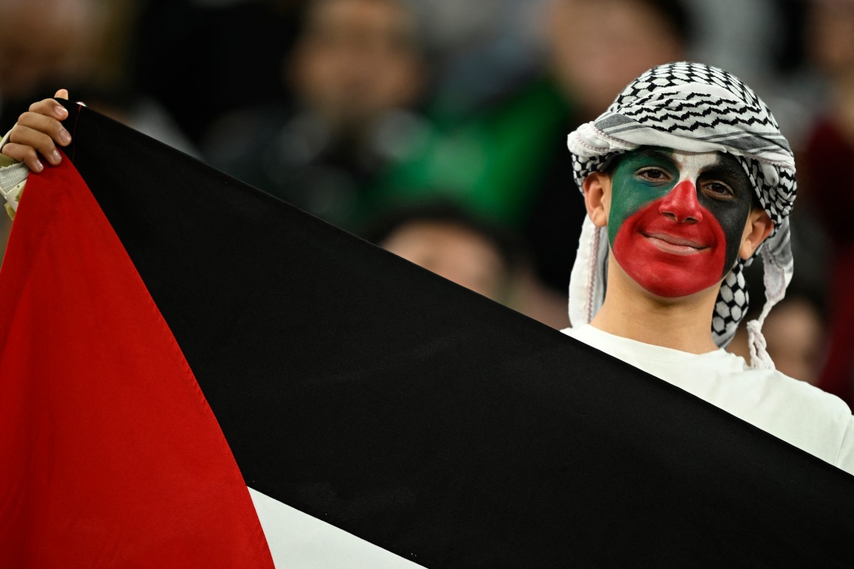 من مباراة سوريا وفلسطين. (أ ف ب)