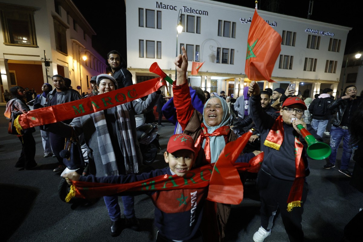 من احتفالات الجمهور المغربي. (أ ف ب) 