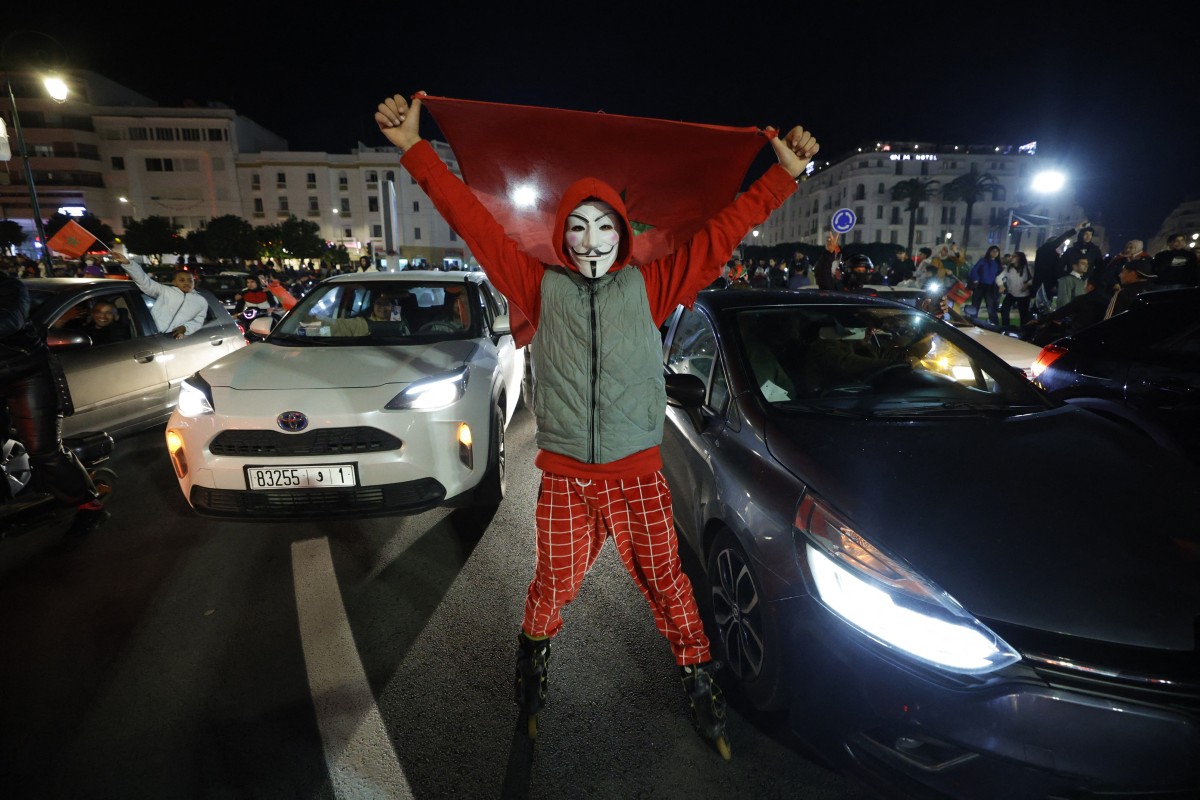 من احتفالات الجمهور المغربي. (أ ف ب) 