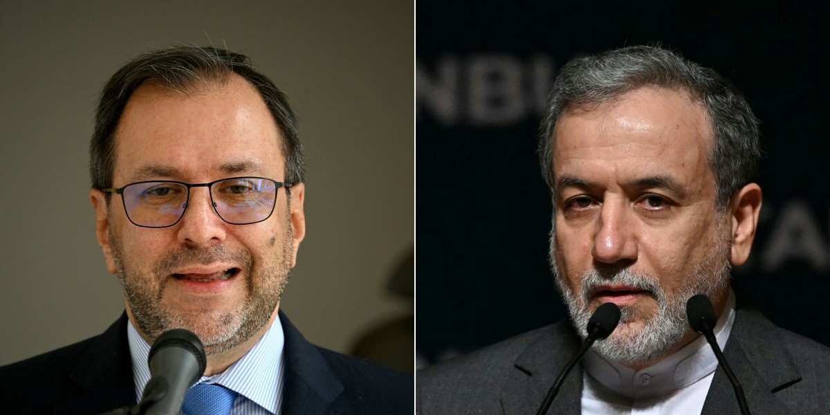 وزير خارجية فنزويلا إيفان جيل  ووزير خارجية إيران عباس عراقجي. (أ ف ب)