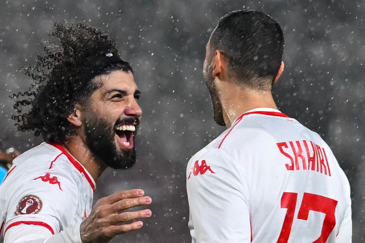 لاعبو تونس. (أ ف ب)