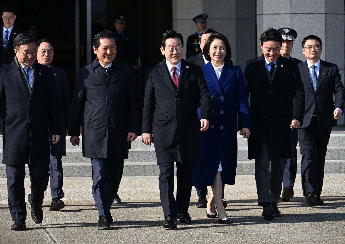 وفد كوريا الجنوبية في بكين (أ ف ب).