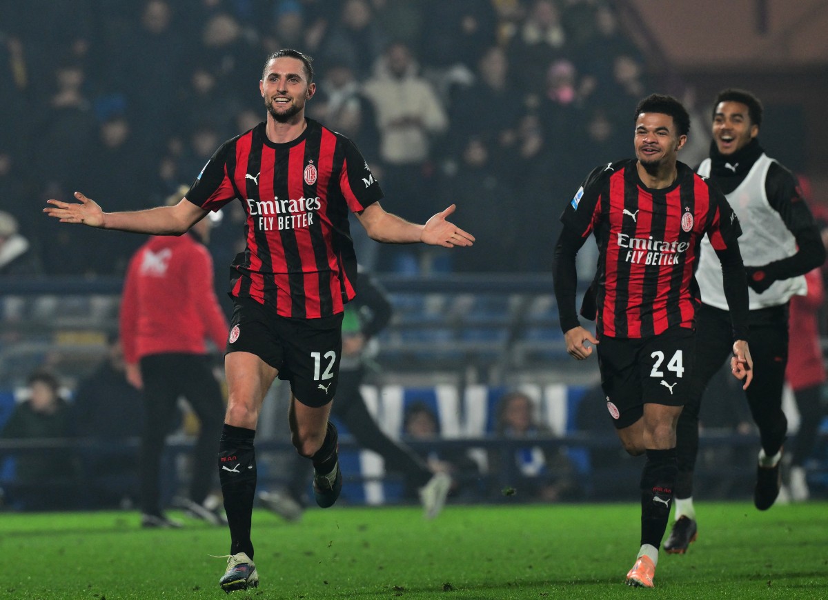 ميلان يقترب من الصدارة. (أ ف ب)