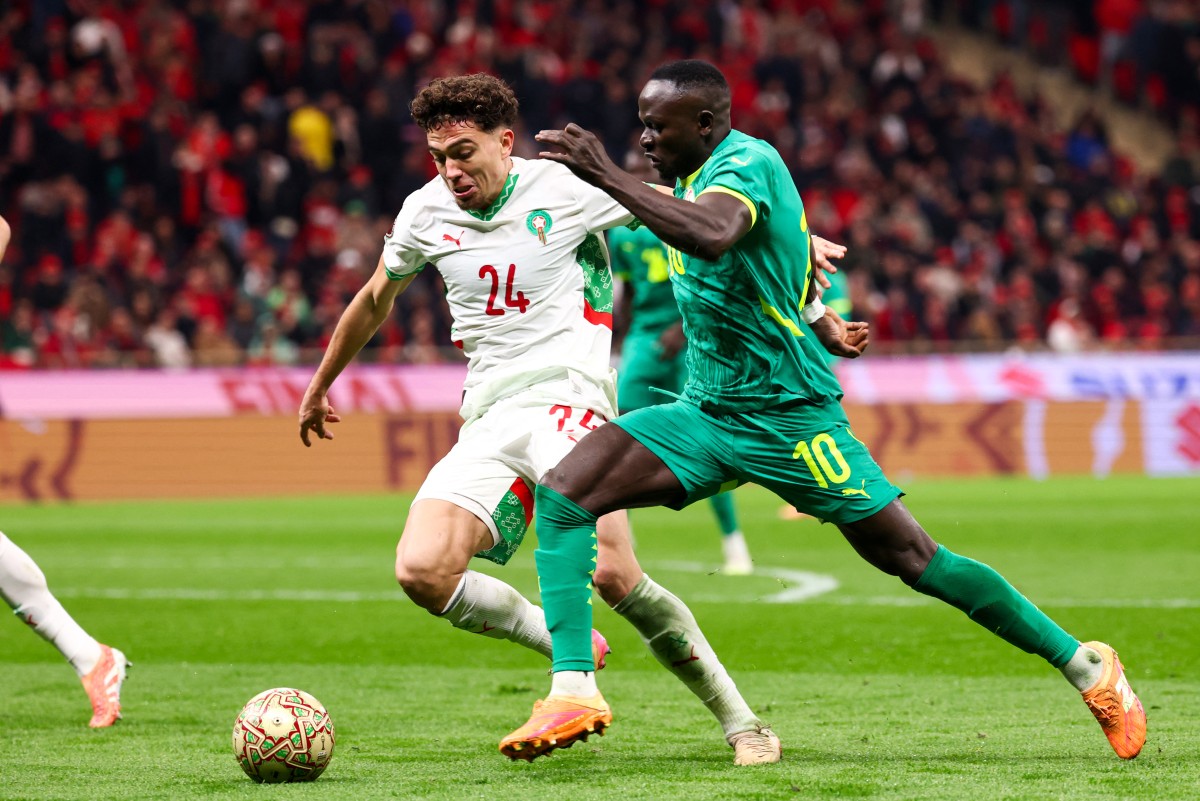 نائل العيناوي مع منتخب المغرب. (أ ف ب)