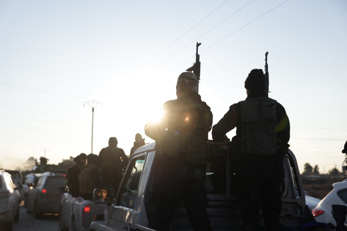 عناصر من الأمن السوري في الرقة (أ ف ب).