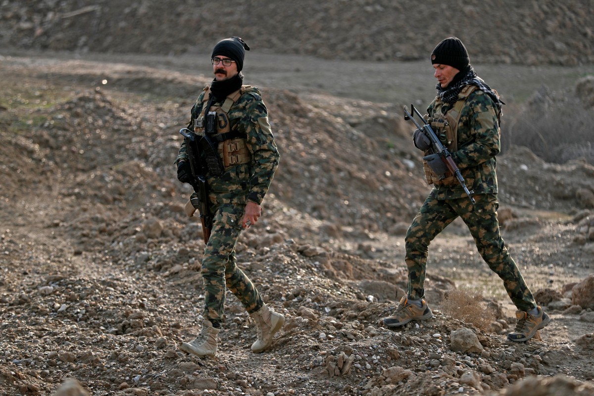 عناصر من الحشد الشعبي (أ ف ب).