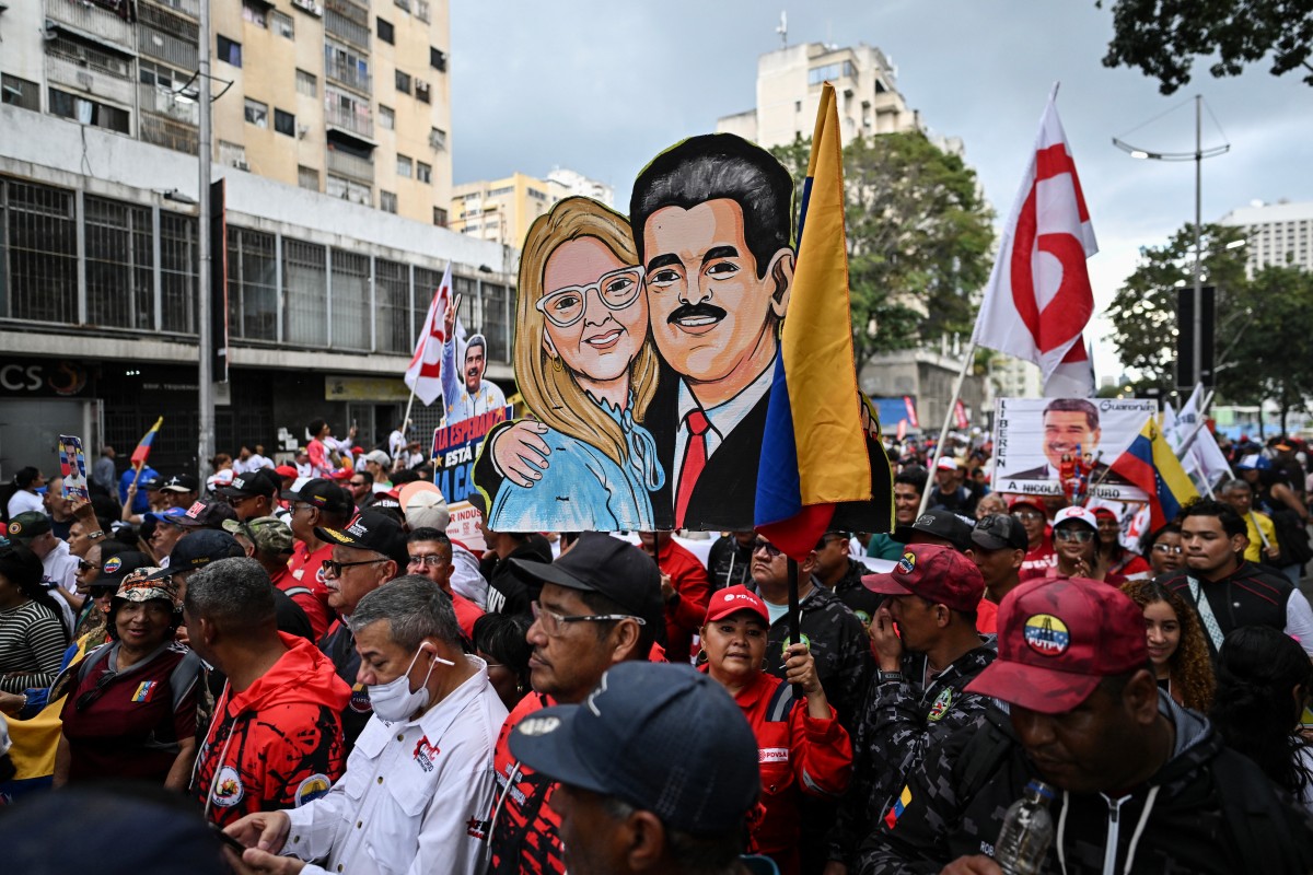 مناصرون لمادورو خلال تظاهرة في فنزويلا (أ ف ب).