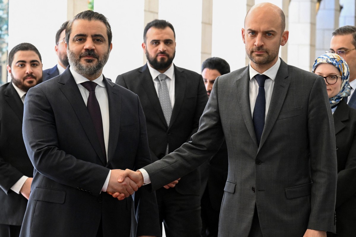 لقاء بارو والشيباني في دمشق (أ ف ب).