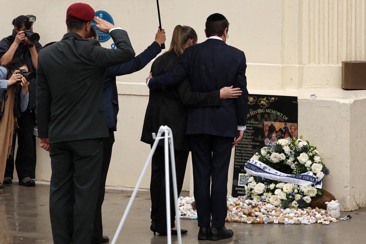 هرتسوغ في أستراليا. (أ ف ب)