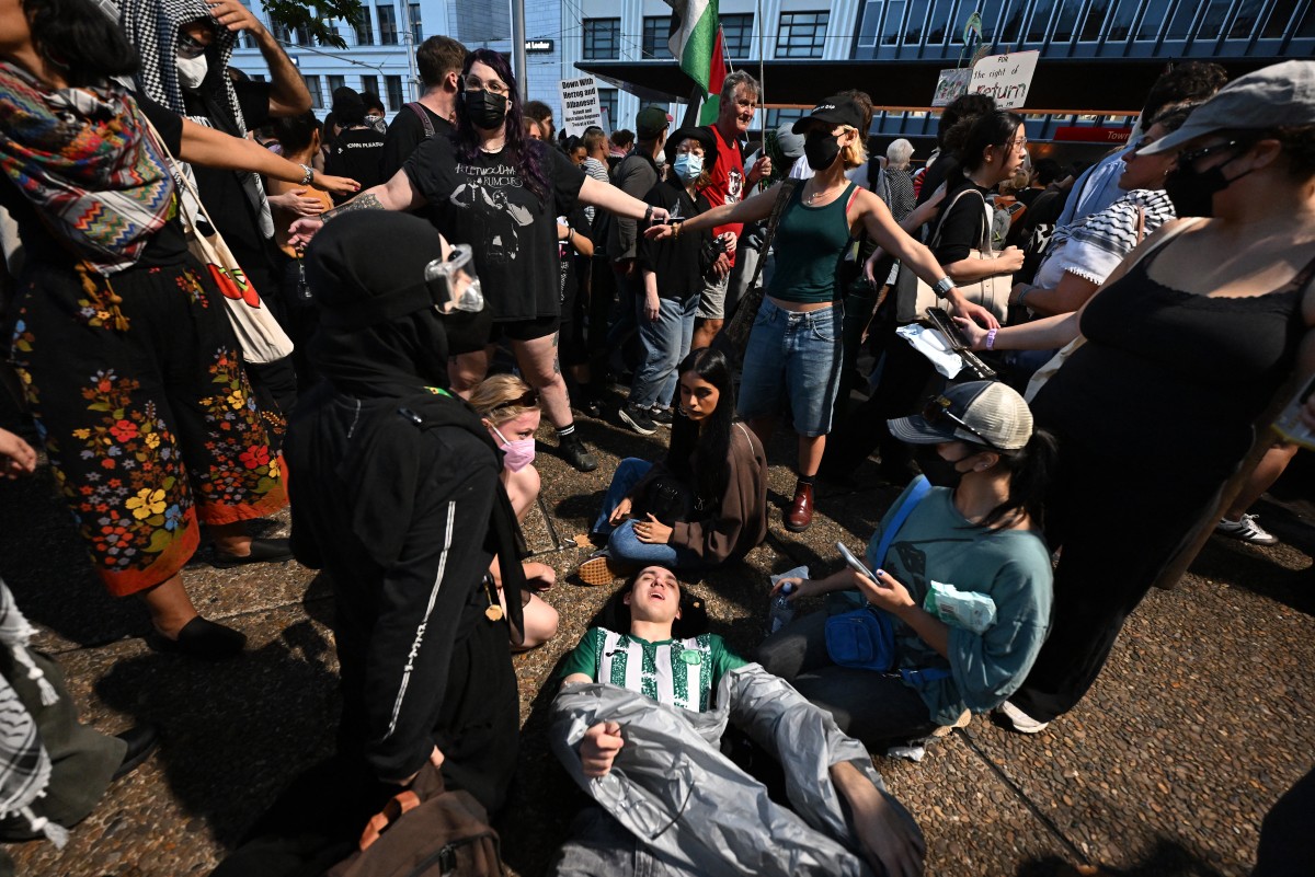 تظاهرات في سيدني ضد زيارة الرئيس الإسرائيلي إسحاق هرتسوغ إلى أستراليا. (أ ف ب)