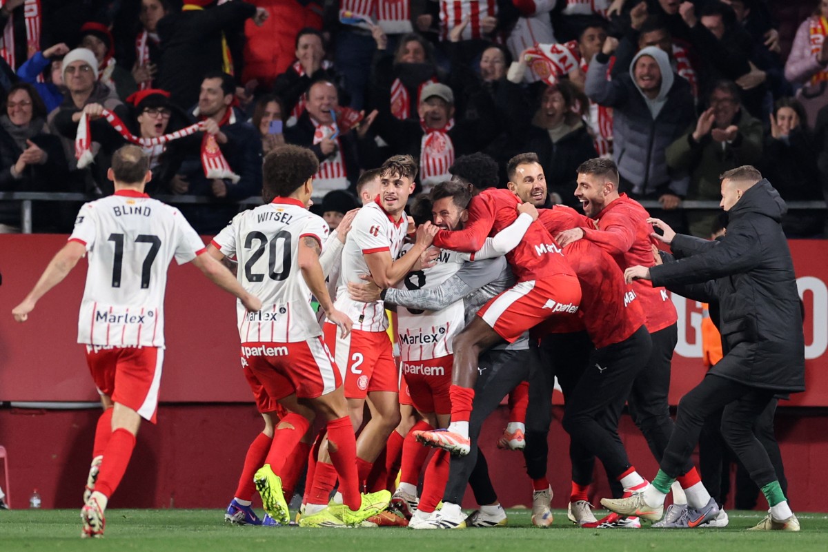 فرحة جيرونا بالفوز على برشلونة. (أ ف ب)