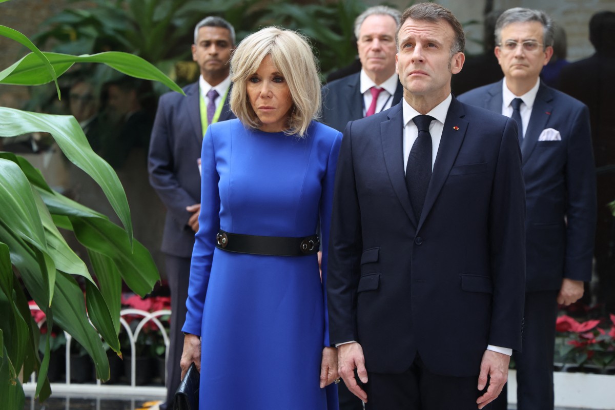 ماكرون وزوجته بريجيت في زيارة إلى الهند (أ ف ب).