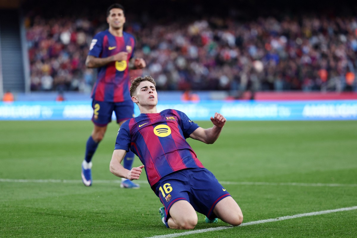 برشلونة لتعزيز صدارته لجدول ترتيب الدوري الإسباني. (أ ف ب)