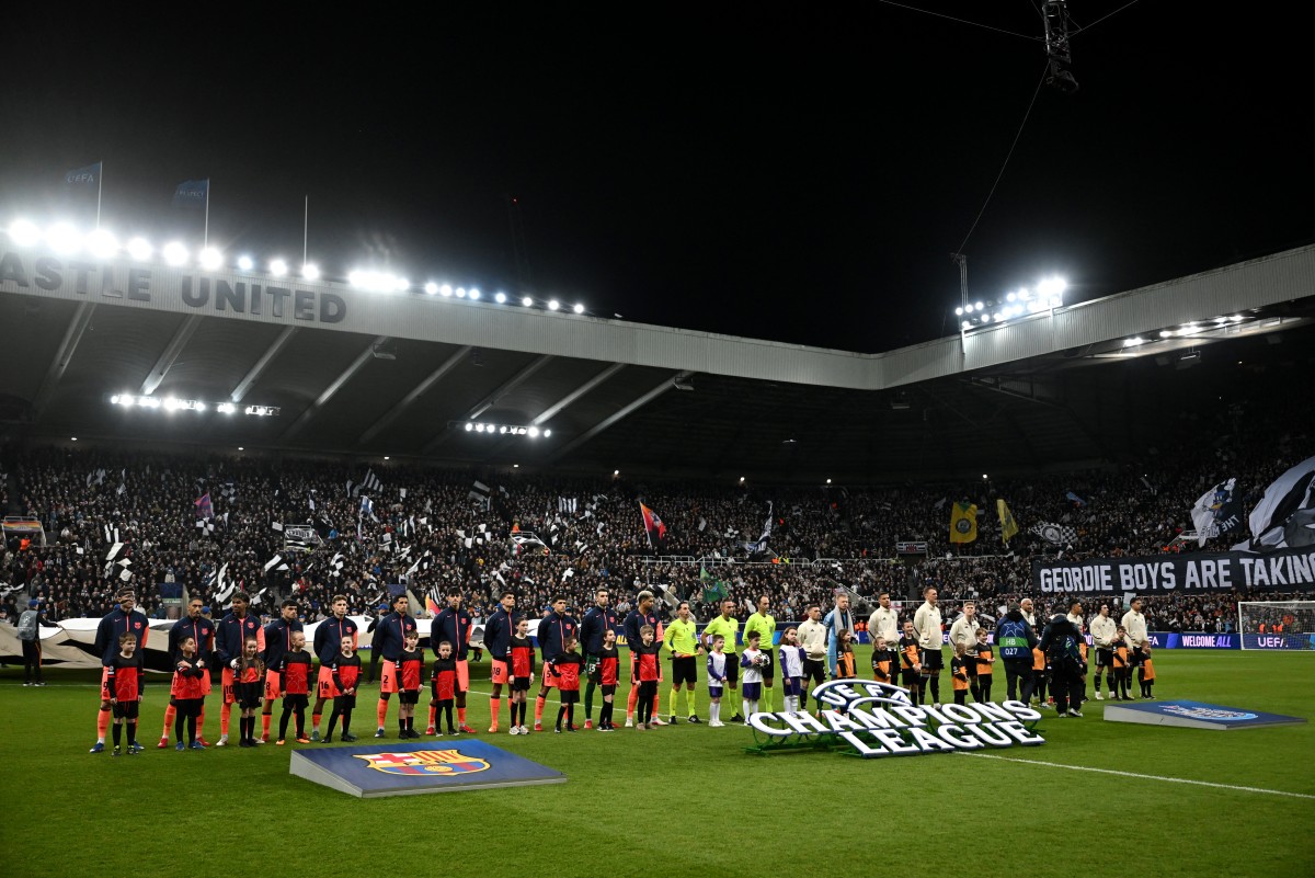 من لقاء برشلونة ونيوكاسل يونايتد في دوري أبطال أوروبا. (أ ف ب)