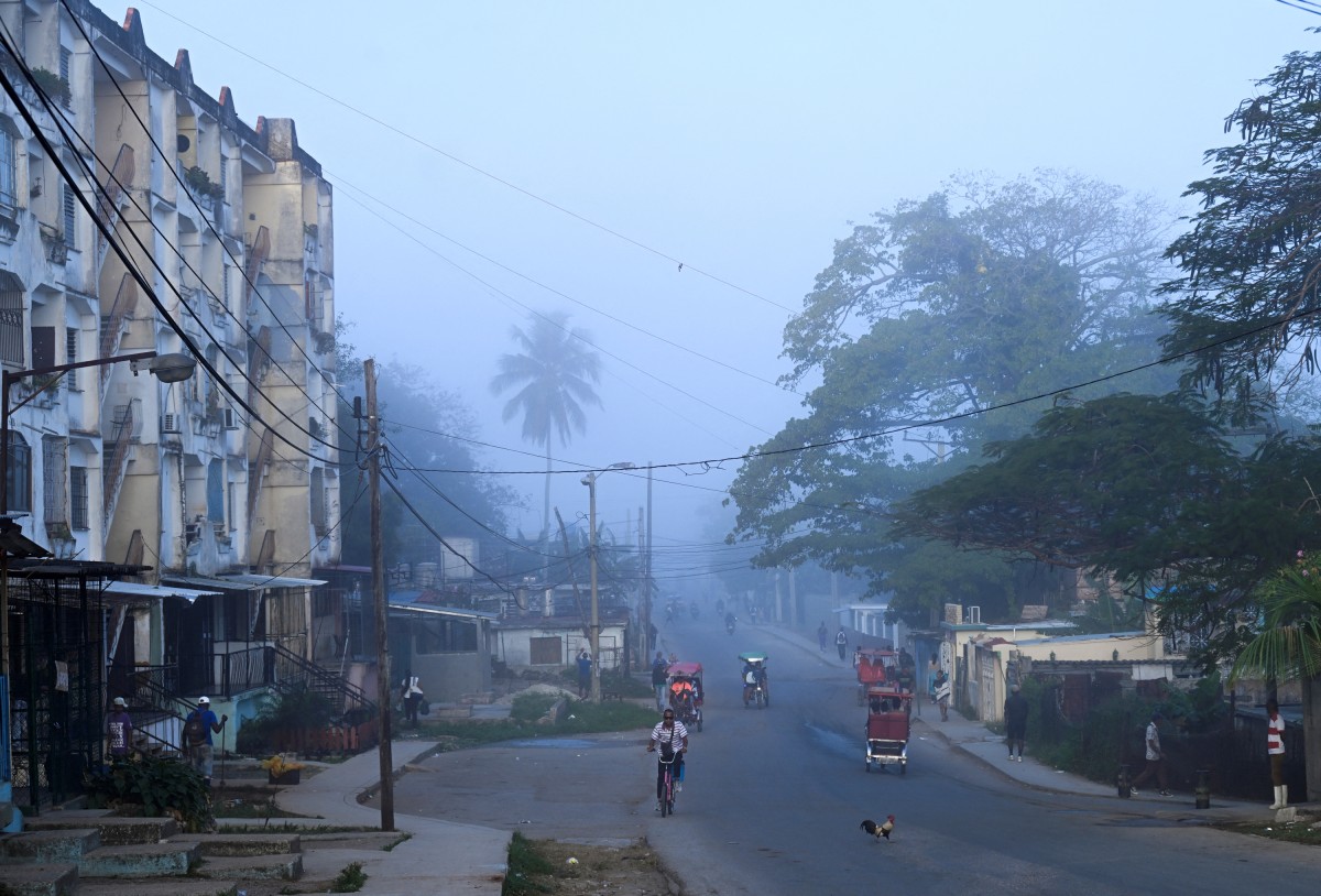  أحد شوارع حي لا غينيرا في هافانا. (أ ف ب)