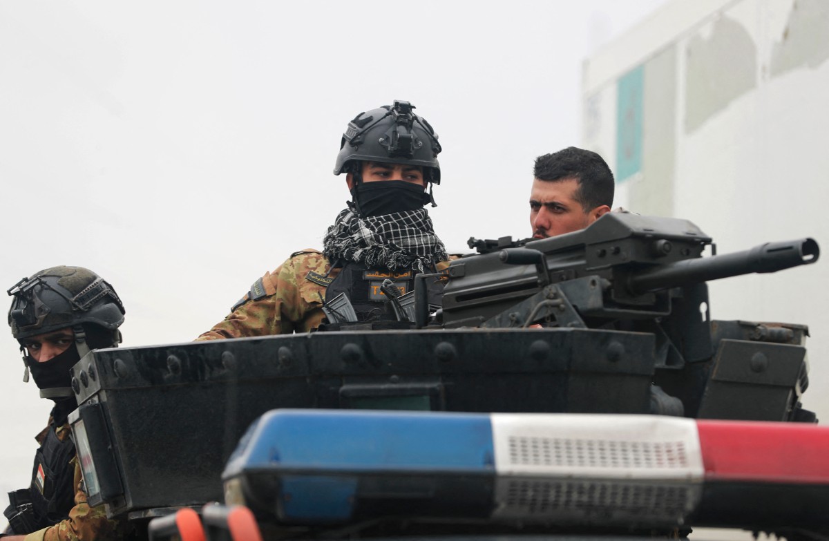 عنصر في الحشد الشعبي. (أ ف ب)