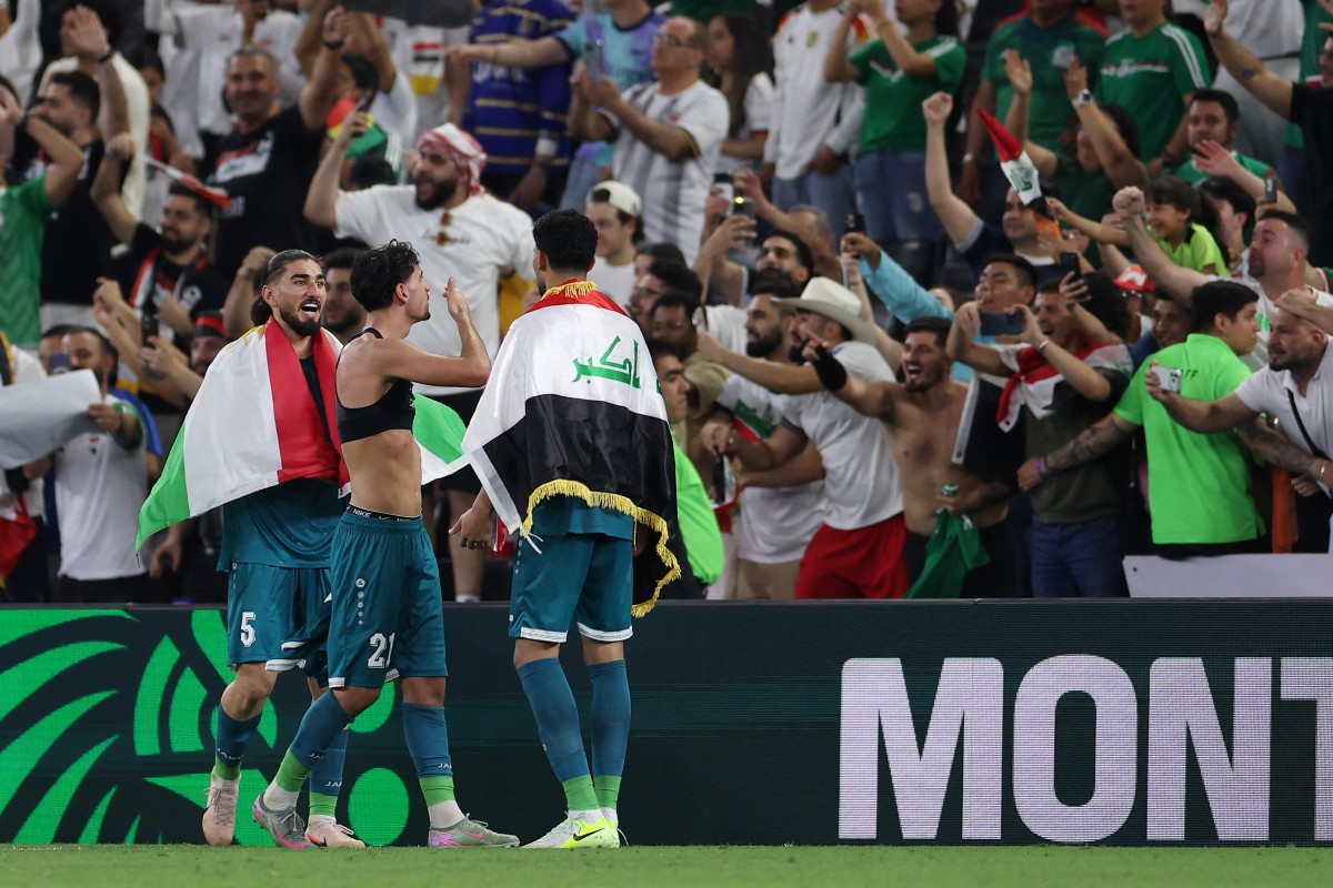 لاعبو العراق. (أ ف ب)