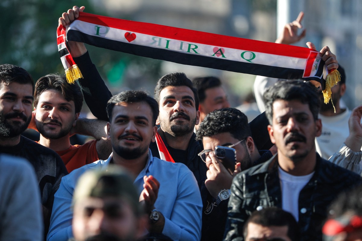 احتفالات الشعب العراقي في الشوارع بعد حسم التأهل إلى كأس العالم 2026. (أ ف ب)