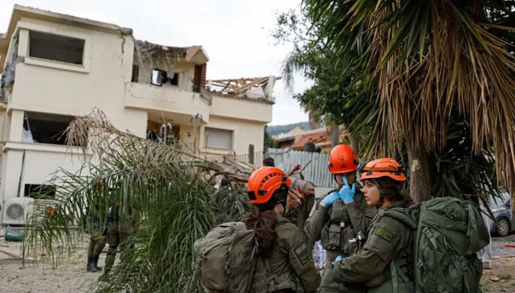 Hezbollah launches drone and rocket attacks on northern Israel as sirens sound