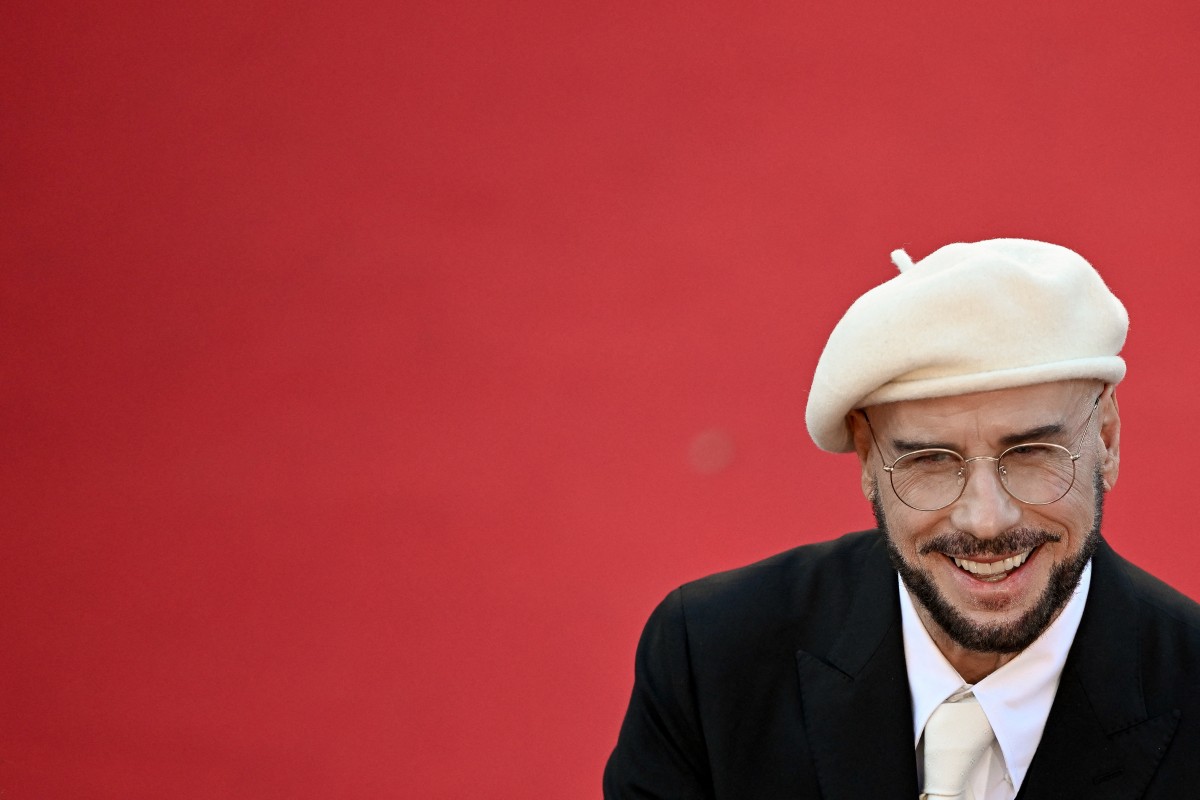 جون ترافولتا في مهرجان كان السينمائي. (أ ف ب)