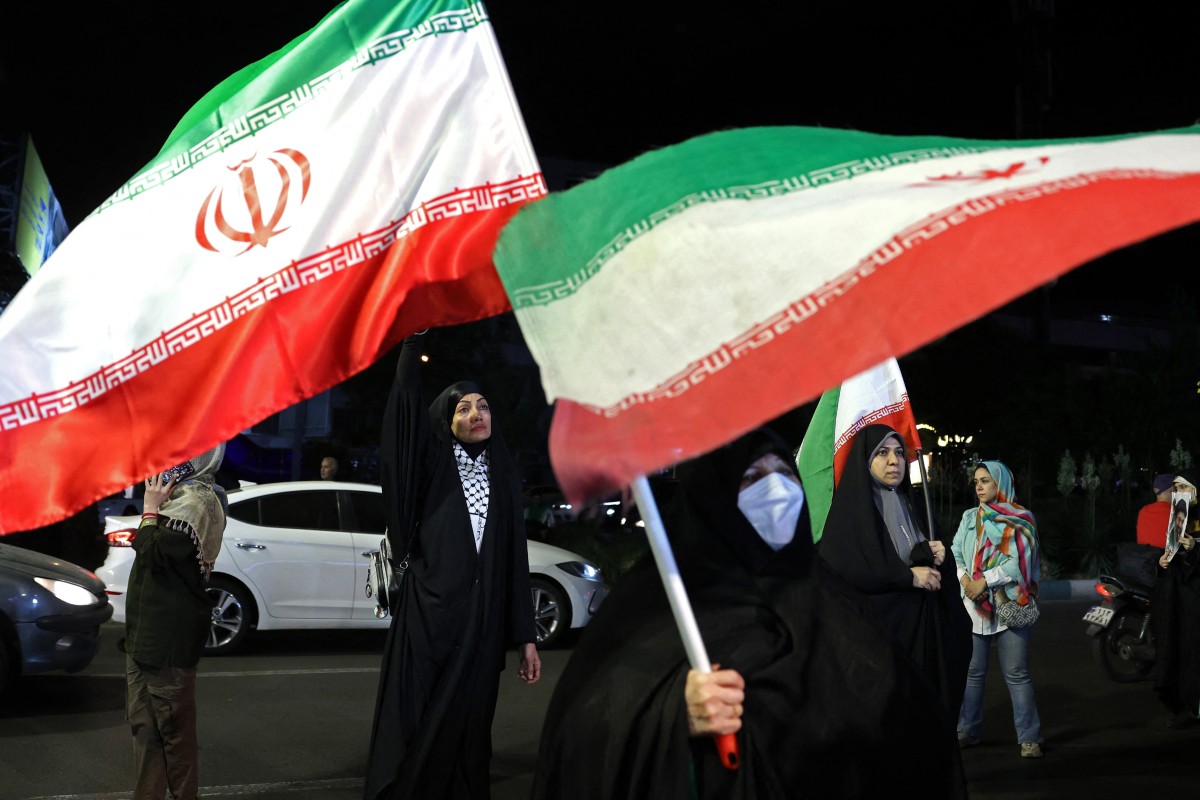 مناصرون للنظام الإيراني في طهران (أ ف ب).