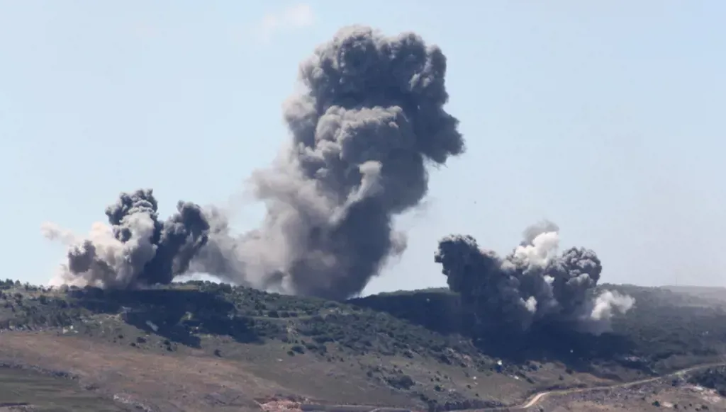 Smoke rises following an Israeli airstrike on the southern village of Mazraat Ali al-Taher. (AFP)